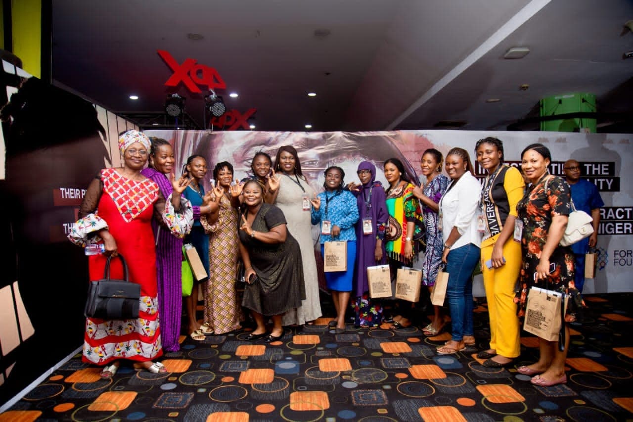 Deaf women together smiling